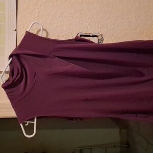 A turtle neck muscle nice purple shirt